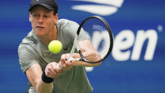 Jannik Sinner, of Italy, returns a shot to Mackenzie McDonald, of the United States, during the first round of the U.S. Open tennis championships, Tuesday, Aug. 27, 2024, in New York. (AP Photo/Kirsty Wigglesworth)