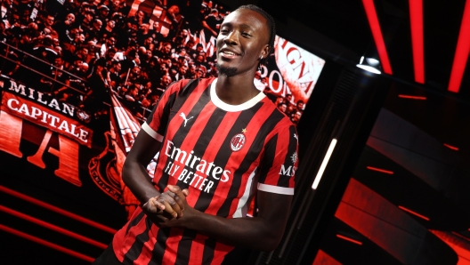 MILAN, ITALY - AUGUST 30: AC Milan new signing Tammy Abraham poses for a photo at Casa Milan at Casa Milan on August 30, 2024 in Milan, Italy. (Photo by Giuseppe Cottini/AC Milan via Getty Images)