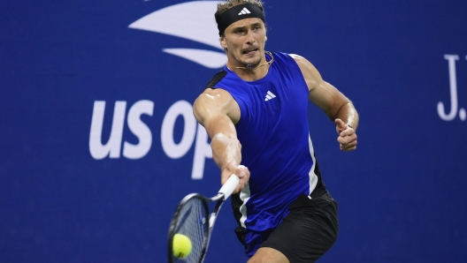 Germany's Alexander Zverev returns a shot to Argentina's Tomas Martin Etcheverry during a third round match of the U.S. Open tennis championships, Saturday, Aug. 31, 2024, in New York. (AP Photo/Frank Franklin II)