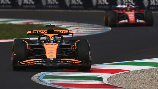 MONZA, ITALY - SEPTEMBER 01: Oscar Piastri of Australia driving the (81) McLaren MCL38 Mercedes leads Charles Leclerc of Monaco driving the (16) Ferrari SF-24 during the F1 Grand Prix of Italy at Autodromo Nazionale Monza on September 01, 2024 in Monza, Italy. (Photo by Rudy Carezzevoli/Getty Images)