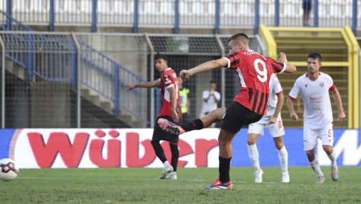 BUSTO ARSIZIO, ITALY - SEPTEMBER 01: Francesco Camarda of Milan Futuro scores his goal from the penalty spot during the Serie C match between Milan Futuro and Carpi at Stadio Carlo Speroni on September 01, 2024 in Busto Arsizio, Italy.  (Photo by Giuseppe Cottini/AC Milan via Getty Images)