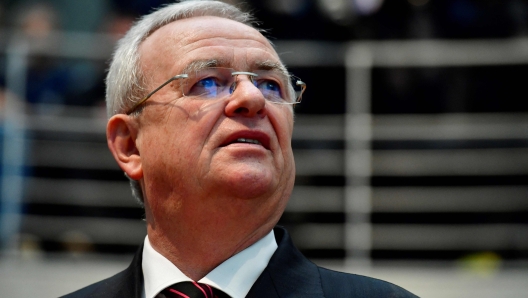 (FILES) Former Volkswagen boss Martin Winterkorn is pictured before taking his seat inside the Bundestag (Lower house of parliament) compound, on January 19, 2017 in Berlin, where he faces a grilling by German lawmakers, as accusations grow of top executives at the beleaguered auto giant VW colluding to cover up emissions cheating. A German court said on December 28, 2023 it would resume the trial of former Volkswagen boss Martin Winterkorn for market manipulation, due to the indefinite suspension of parallel proceedings on fraud charges. Winterkorn was set to be tried for fraud for his role in the "dieselgate" emissions-cheating scandal, along with other managers from the automotive group. (Photo by John MACDOUGALL / AFP)