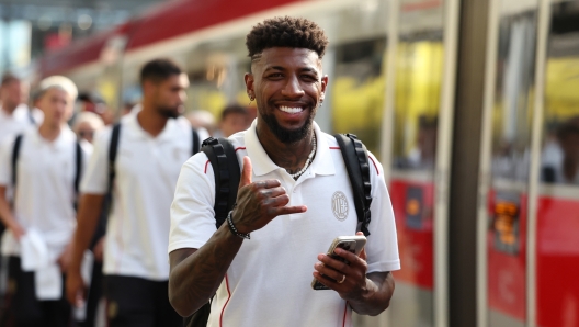 MILAN, ITALY - AUGUST 23: Emerson Royal of AC Milan leaves by train from Milan for Parma station at Stazione Centrale on August 23, 2024 in Milan, Italy. (Photo by Claudio Villa/AC Milan via Getty Images)