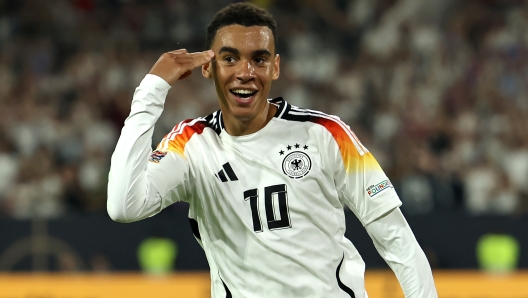 DUESSELDORF, GERMANY - SEPTEMBER 07: Jamal Musiala of Germany celebrates scoring his team's second goal during the UEFA Nations League 2024/25 League A Group A3 match between Germany and Hungary at Merkur Spiel-Arena on September 07, 2024 in Duesseldorf, Germany. (Photo by Christof Koepsel/Getty Images)