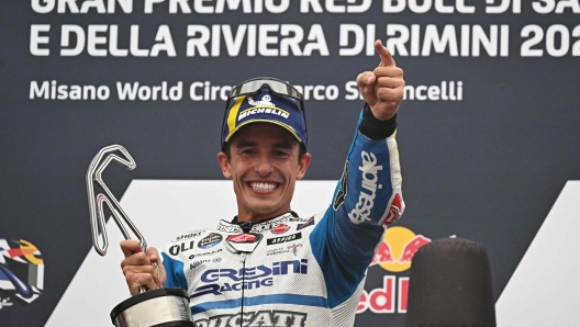 Gresini Racing MotoGP's Spanish rider Marc Marquez celebrates on the podium after winning the San Marino MotoGP at the Misano World Circuit Marco-Simoncelli in Misano Adriatico on September 8, 2024. (Photo by Gabriel BOUYS / AFP)