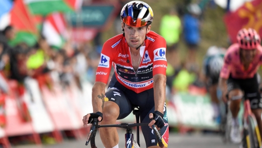 Overall leader Team Bora's Primoz Roglic crosses third the finish line of the stage 20 of the Vuelta a Espana, a 172 km race between Villarcayo and Picon Blanco, on September 7, 2024. (Photo by ANDER GILLENEA / AFP)