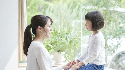 Asian mother talking with the daughter