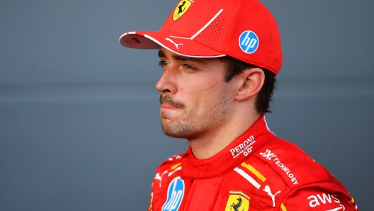 BAKU, AZERBAIJAN - SEPTEMBER 15: Second placed Charles Leclerc of Monaco and Ferrari looks on in parc ferme during the F1 Grand Prix of Azerbaijan at Baku City Circuit on September 15, 2024 in Baku, Azerbaijan. (Photo by James Sutton/Getty Images)