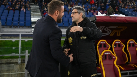 ROME, ITALY - FEBRUARY 26: AS Roma coach Daniele De Rossi anto Torino FC coach Ivan Juric during the Serie A TIM match between AS Roma and Torino FC at Stadio Olimpico on February 26, 2024 in Rome, Italy. (Photo by Fabio Rossi/AS Roma via Getty Images)