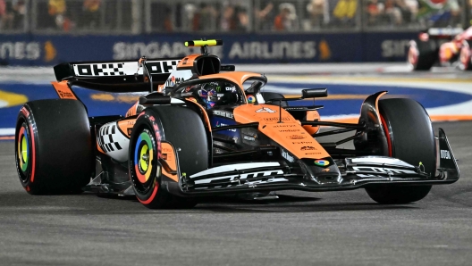 McLaren's British driver Lando Norris drives during the qualifying session ahead of the Formula One Singapore Grand Prix night race at the Marina Bay Street Circuit in Singapore on September 21, 2024. (Photo by ROSLAN RAHMAN / AFP)