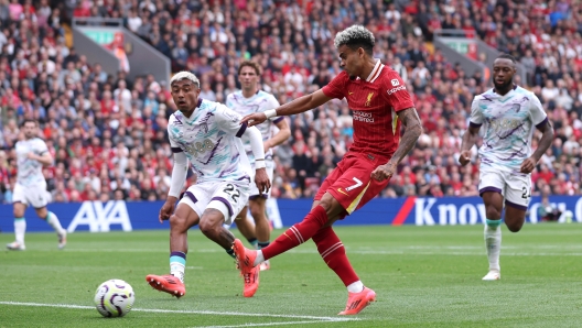 LIVERPOOL, ENGLAND - SEPTEMBER 21: Luis Diaz of Liverpool scores his team's second goal during the Premier League match between Liverpool FC and AFC Bournemouth at Anfield on September 21, 2024 in Liverpool, England. (Photo by Alex Livesey/Getty Images)