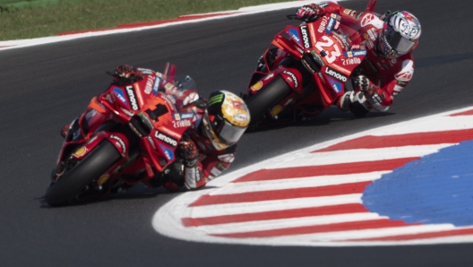 MISANO ADRIATICO, ITALY - SEPTEMBER 21: Francesco Bagnaia of Italy and Ducati Lenovo Team leads Enea Bastianini of Italy and Ducati Lenovo Team  during the MotoGP Of Emilia Romagna - Sprint at Misano World Circuit on September 21, 2024 in Misano Adriatico, Italy.  (Photo by Mirco Lazzari gp/Getty Images)