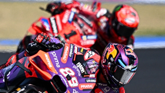 Ducati Spanish rider Jorge Martin rides ahead of Ducati Italian rider Francesco Bagnaia during the sprint race of the San Marino MotoGP Grand Prix at the Misano World Circuit Marco-Simoncelli in Misano Adriatico on September 7, 2024. (Photo by GABRIEL BOUYS / AFP)