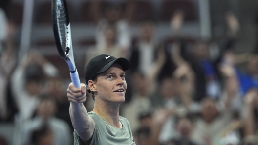 Jannick Sinner of Italy gestures to supporters after defeating Roman Safiullin of Russia during the China Open tennis tournament held at the National Tennis Center in Beijing, Saturday, Sept. 28, 2024. (AP Photo/Ng Han Guan)