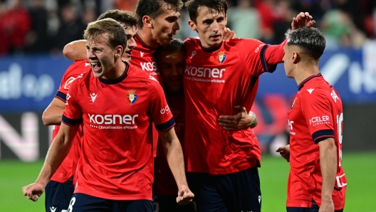 epa11631197 Osasuna's players celebrate after scoring their third goal during the Spanish LaLiga soccer match between CA Osasuna and FC Barcelona at El Sadar stadium in Pamplona, Spain, 28 September 2024.  EPA/Villar Lopez