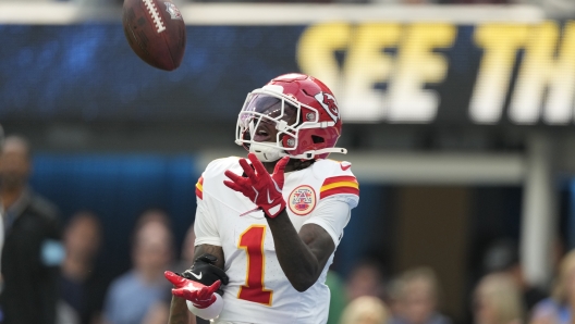 Kansas City Chiefs wide receiver Xavier Worthy catches a 54-yard touchdown pass during the first half of an NFL football game against the Los Angeles Chargers Sunday, Sept. 29, 2024, in Inglewood, Calif. (AP Photo/Ashley Landis)