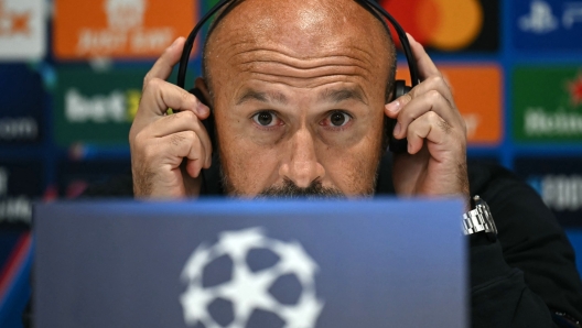 Bologna's Italian coach Vincenzo Italiano attends during a press conference on the eve of their UEFA Champions League 1st round day 2 football match against Liverpool, at Anfield in Liverpool, north west England, on October 1, 2024. (Photo by Paul ELLIS / AFP)