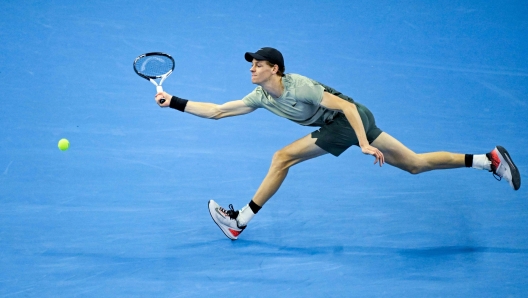 Italys Jannik Sinner hits a return to Spains Carlos Alcaraz during their mens singles final match at the China Open tennis tournament in Beijing on October 2, 2024. (Photo by WANG Zhao / AFP)