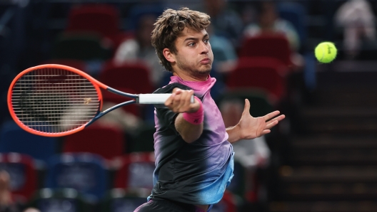 SHANGHAI, CHINA - OCTOBER 07: Flavio Cobolli of Italy plays a shoot in the Men's Singles second round match against Stan Wawrinka of Switzerland during the on Day 8 of 2024 Shanghai Rolex Masters at Qi Zhong Tennis Centre on October 07, 2024 in Shanghai, China. (Photo by Lintao Zhang/Getty Images)