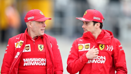 SHANGHAI, CHINA - APRIL 11: Charles Leclerc of Monaco and Ferrari talks with Jock Clear, Head of Engineering, Scuderia Ferrari in the Paddock during previews ahead of the F1 Grand Prix of China at Shanghai International Circuit on April 11, 2019 in Shanghai, China. (Photo by Charles Coates/Getty Images)