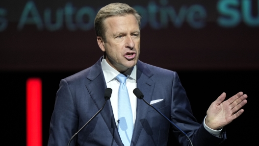 CEO of BMW Group Oliver Zipse speaks during the Paris Automotive Summit on the sideline of the Paris Auto Show, in Paris, Tuesday, Oct. 15, 2024. (AP Photo/Michel Euler)