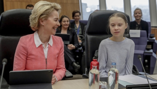 epaselect epa08268511 Swedish climate activist Greta Thunberg (R)  sits next to European Commission (EC) President Ursula von der Leyen (L) ahead of the EC's weekly College of Commissioners meeting in Brussels, Belgium, 04 March 2020. The College is set to pass a new European Climate Law proposal, which would increase the current greenhouse gas emission reduction targets for 2030, with the ultimate goal being attaining complete climate neutrality (that is, achieving net zero emissions for EU countries as a whole) by 2050.  EPA/OLIVIER HOSLET