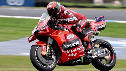 Ducati Lenovo team rider Francesco Bagnaia of Italy speeds through a corner during a second practice session at the Australian MotoGP on Philip Island on October 18, 2024. (Photo by William WEST / AFP) / -- IMAGE RESTRICTED TO EDITORIAL USE - STRICTLY NO COMMERCIAL USE --