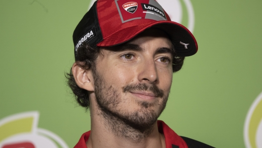 BURIRAM, THAILAND - OCTOBER 23: Francesco Bagnaia of Italy and Ducati Lenovo Team smiles during the press conference pre-event during the MotoGP Of Thailand - Previews at Chang International Circuit on October 24, 2024 in Buriram, Thailand. (Photo by Mirco Lazzari gp/Getty Images)