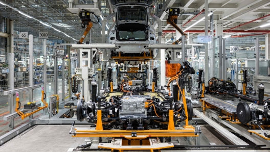 An electric car is manufactured at the production plant of the German car manufacturer Volkswagen in Zwickau, eastern Germany, on 20 August 2024. AFP PHOTO / JENS SCHLUETER (Photo by JENS SCHLUETER / AFP)