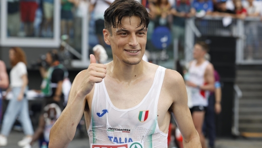 Silver medallist, Pietro Riva of Team Italy, celebrates winning  in the Half Marathon Men Final at the European Athletics Championship at Olimpico Stadium in Rome, Italy, 09 June 2024. ANSA/FABIO FRUSTACI