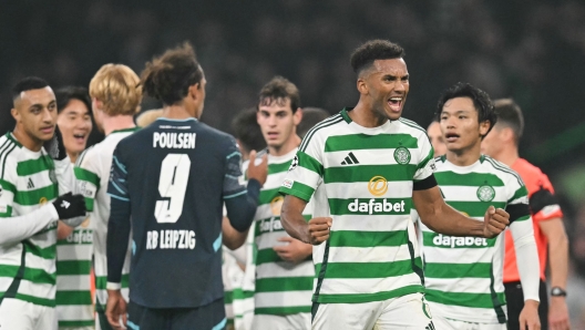 Celtic's US defender #06 Auston Trusty celebrates at the end of the UEFA Champions League football match between Celtic and RB Leipzig at Celtic Park stadium, in Glasgow, Scotland, on November 5, 2024. Celtic wins 3 - 1 against RB Leipzig. (Photo by ANDY BUCHANAN / AFP)