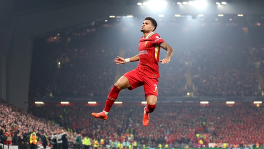 LIVERPOOL, ENGLAND - NOVEMBER 05: Luis Diaz of Liverpool celebrates scoring his team's first goal during the UEFA Champions League 2024/25 League Phase MD4 match between Liverpool FC and Bayer 04 Leverkusen at Anfield on November 05, 2024 in Liverpool, England. (Photo by Carl Recine/Getty Images)