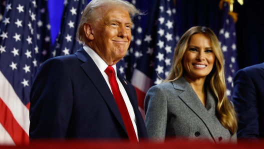 WEST PALM BEACH, FLORIDA - NOVEMBER 06: Republican presidential nominee, former U.S. President Donald Trump and former first lady Melania Trump look on during an election night event at the Palm Beach Convention Center on November 06, 2024 in West Palm Beach, Florida. Americans cast their ballots today in the presidential race between Republican nominee former President Donald Trump and Vice President Kamala Harris, as well as multiple state elections that will determine the balance of power in Congress.   Chip Somodevilla/Getty Images/AFP (Photo by CHIP SOMODEVILLA / GETTY IMAGES NORTH AMERICA / Getty Images via AFP)