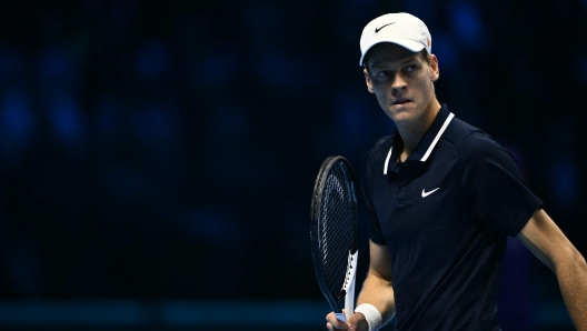 Italy's Jannik Sinner reacts during his match against Russia's Daniil Medvedev at the ATP Finals tennis tournament in Turin on November 14, 2024. (Photo by Marco BERTORELLO / AFP)