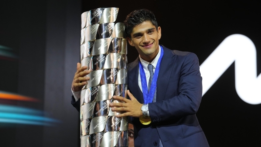 epa11726536 Spanish MotoGP rider Jorge Martin of Prima Pramac Racing team poses with his MotoGP World Championship trophy during a ceremony after he positioned third in the Barcelona Solidarity MotoGP Grand Prix at Montmelo track in Barcelona, 17 November 2024.  EPA/Alejandro Garcia