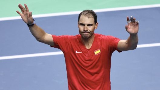 MALAGA, SPAIN - NOVEMBER 19: Rafael Nadal of Team Spain waves to the fans after loosing his singles match against Botic van de Zandschulp of Team Netherlands in the quarterfinal tie between Netherlands and Spain during the Davis Cup Finals at Palacio de Deportes Jose Maria Martin Carpena on November 19, 2024 in Malaga, Spain. (Photo by Matt McNulty/Getty Images for ITF)