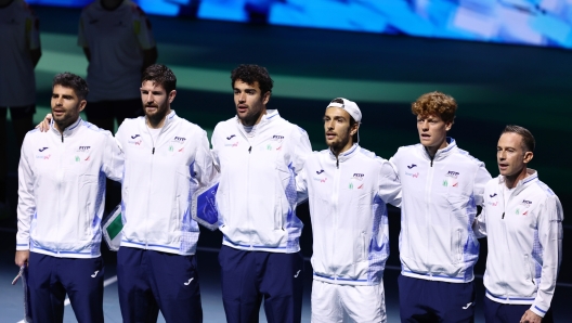 MALAGA, SPAIN - NOVEMBER 21: Players of Italy line up for the opening ceremony during the Davis Cup Quarter Final match between Italy and Argentina at Palacio de Deportes Jose Maria Martin Carpena on November 21, 2024 in Malaga, Spain.  (Photo by Matt McNulty/Getty Images for ITF)