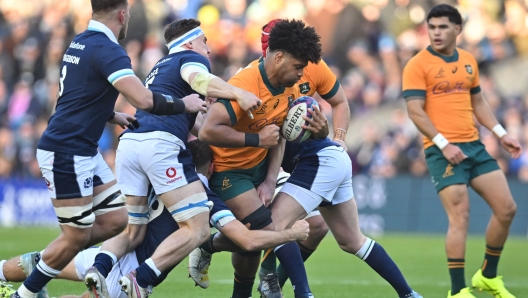 Australia's flanker Rob Valetini is tackled during the Autumn Nations Series International rugby union test match between Scotland and Australia at Murrayfield Stadium in Edinburgh on November 24, 2024. (Photo by ANDY BUCHANAN / AFP)