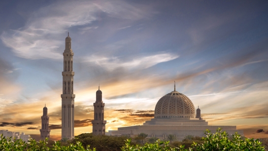 Muscat sunset landscape, Oman, Sultan Qaboos Grand Mosque building architecture