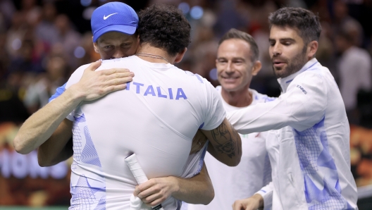 MALAGA, SPAIN - NOVEMBER 24:  Matteo Berrenttini celebrates after Jannik Sinner of Team Italy wins his single match against Tallon Griekspoor of Team Netherlands and win the Davis Cup Finals in the final tie between Italy and Netherlands during the Davis Cup Finals at Palacio de Deportes Jose Maria Martin Carpena on November 24, 2024 in Malaga, Spain. (Photo by Clive Brunskill/Getty Images for ITF)