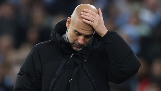 MANCHESTER, ENGLAND - NOVEMBER 26: Pep Guardiola, Manager of Manchester City, reacts during the UEFA Champions League 2024/25 League Phase MD5 match between Manchester City and Feyenoord at City of Manchester Stadium on November 26, 2024 in Manchester, England. (Photo by Carl Recine/Getty Images)