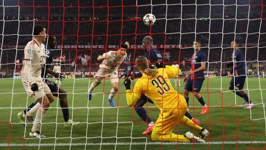 MUNICH, GERMANY - NOVEMBER 26: Kim Min-Jae of Bayern Munich scores his team's first goal past Matvey Safonov of Paris Saint-Germain during the UEFA Champions League 2024/25 League Phase MD5 match between FC Bayern München and Paris Saint-Germain at Football Arena Munich on November 26, 2024 in Munich, Germany. (Photo by Alexander Hassenstein/Getty Images)