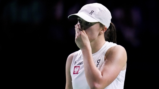 Poland's Iga Swiatek reacts against Linda Noskova of the Czech Republic during the Billie Jean King Cup Finals, at the Martin Carpena Sports Hall, in Malaga, southern Spain, on Saturday, Nov. 16, 2024. (AP Photo/Manu Fernandez)