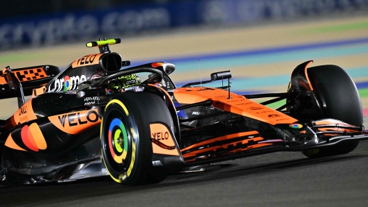 McLaren's British driver Lando Norris drives during the sprint qualifying session ahead of the Qatari Formula One Grand Prix at the Lusail International Circuit in Lusail, north of Doha, on November 29, 2024. (Photo by Giuseppe CACACE / AFP)