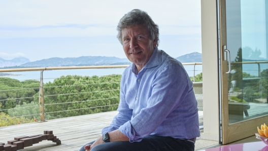 PUNTALDIA, , COSTA SMERALDA, SARDINIA - ITALY- MAY 4, 2022: Tax Consultant Ezio Maria Simonelli (64) poses for a portrait in the living room of his villa H20 on a hilltop in Puntaldia, Sardinia on May 4, 2022. 
(Photo by Federica Valabrega for The Washington Post via Getty Images)