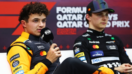 LUSAIL CITY, QATAR - NOVEMBER 30: Sprint winner Oscar Piastri of Australia and McLaren and Second placed Lando Norris of Great Britain and McLaren attend the press conference after the Sprint ahead of the F1 Grand Prix of Qatar at Lusail International Circuit on November 30, 2024 in Lusail City, Qatar. (Photo by Bryn Lennon/Getty Images)