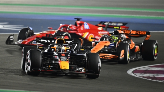 LUSAIL CITY, QATAR - DECEMBER 01: Max Verstappen of the Netherlands driving the (1) Oracle Red Bull Racing RB20 leads Lando Norris of Great Britain driving the (4) McLaren MCL38 Mercedes and Charles Leclerc of Monaco driving the (16) Ferrari SF-24 on track during the F1 Grand Prix of Qatar at Lusail International Circuit on December 01, 2024 in Lusail City, Qatar. (Photo by Clive Mason/Getty Images)