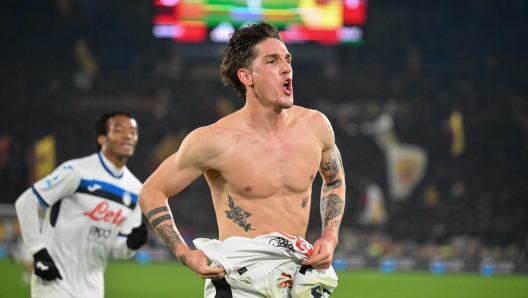 Nicolo' Zaniolo of Atalanta jubilates after scoring the goal during the Italian Serie A soccer match AS Roma vs Atalanta BC at Olimpico stadium in Rome, Italy, 02 December 2024. ANSA/ALESSANDRO DI MEO