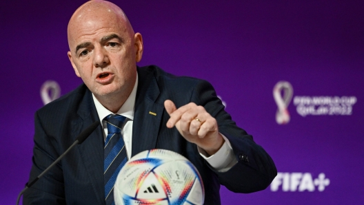 FIFA President Gianni Infantino speaks during a press conference at the Qatar National Convention Center (QNCC) in Doha on November 19, 2022, ahead of the Qatar 2022 World Cup football tournament. - Infantino hit back at Western critics of Qatar's human rights record at his opening press conference of the World Cup on November 19, blasting their "hypocrisy". (Photo by FABRICE COFFRINI / AFP)