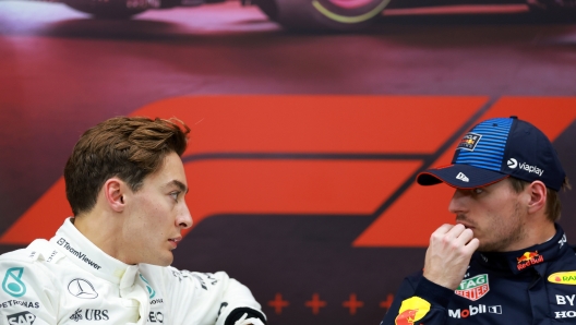 LUSAIL CITY, QATAR - NOVEMBER 30: Pole position qualifier Max Verstappen of the Netherlands and Oracle Red Bull Racing and Second placed qualifier George Russell of Great Britain and Mercedes attend the press conference after qualifying ahead of the F1 Grand Prix of Qatar at Lusail International Circuit on November 30, 2024 in Lusail City, Qatar. (Photo by Bryn Lennon/Getty Images)